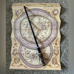 Ebony and Unicorn Heart wand from Ollivander’s in Diagon Alley.  Map included.